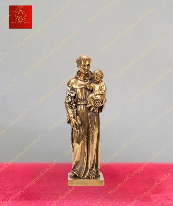 Tượng Thánh Anton hiền từ tay bế Chúa Hài Đồng, tay cầm hoa huệ chất liệu đồng cao 50cm